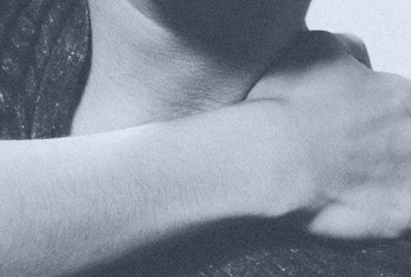 Person holding shoulder